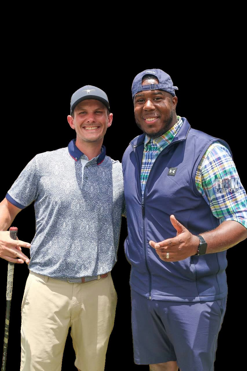 James Kasza with golfer on the course